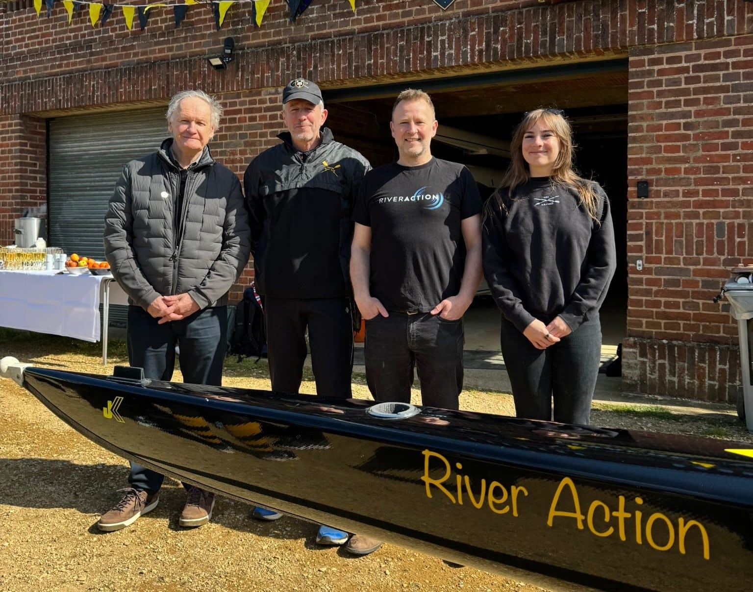 Picture of the named boat with representatives from Linacre and River Action.