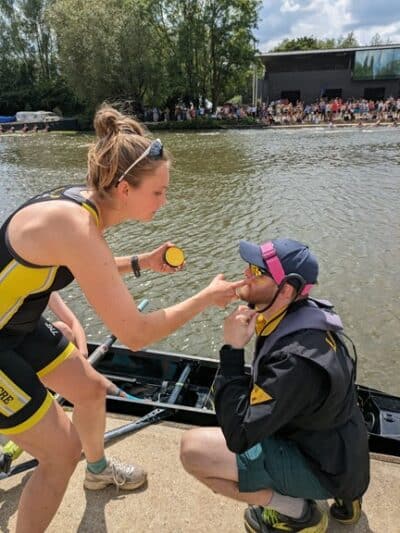 W1 cox Fergus gets his face painted by women’s captain Marina